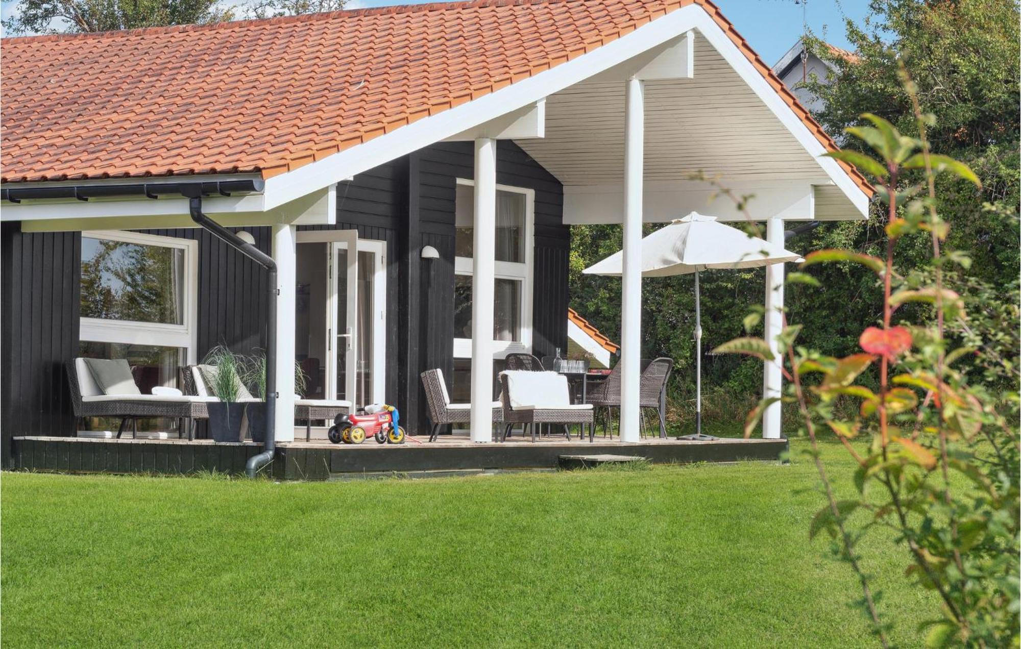 Three-Bedroom Holiday Home in Askeby Buitenkant foto